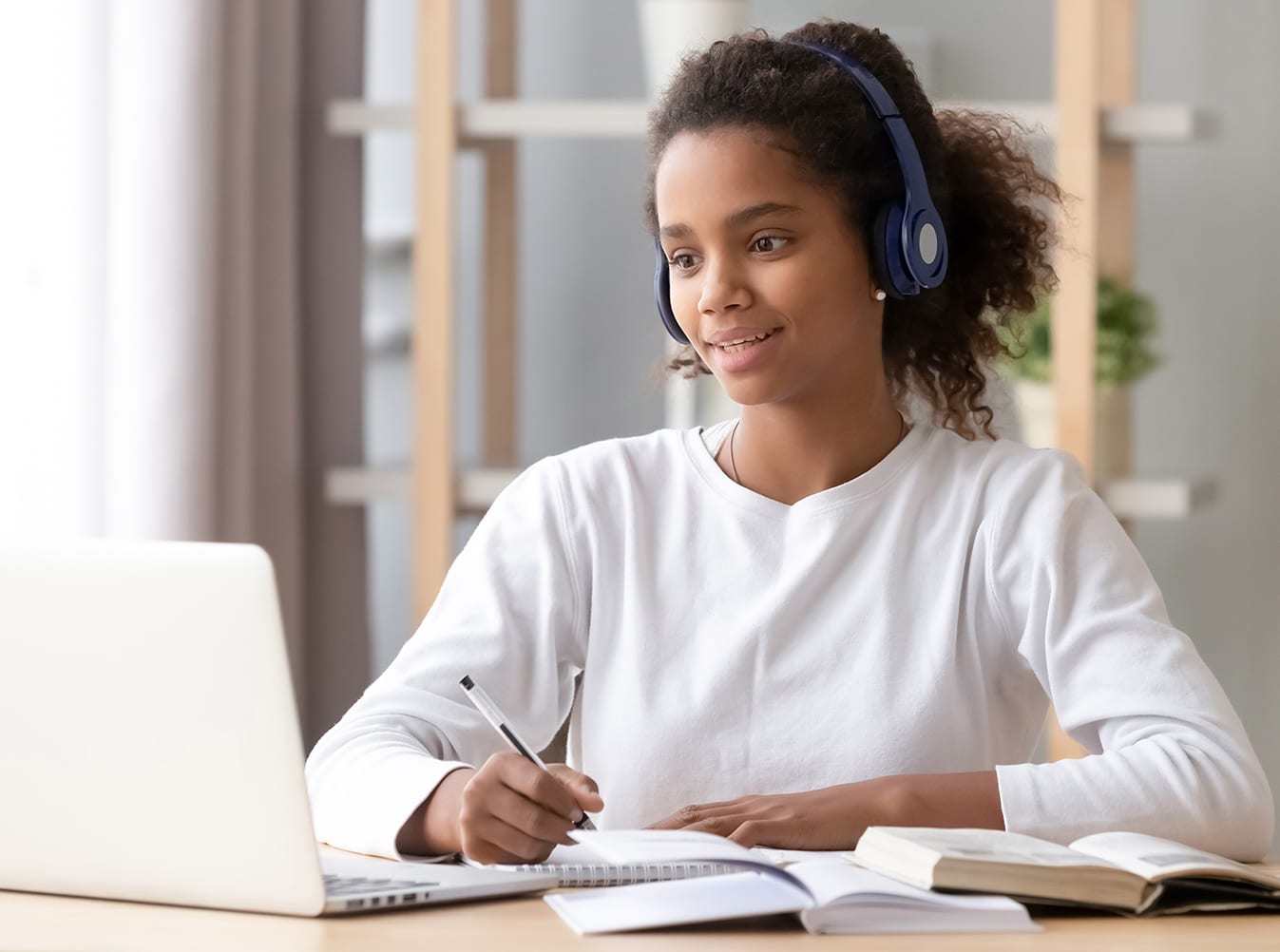 Woman studying on her computer